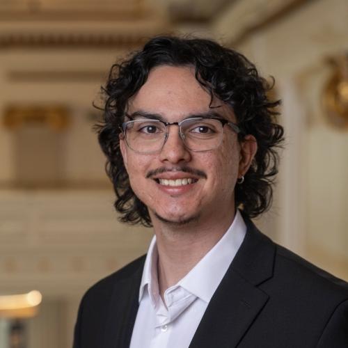 headshot milken alumni symposium